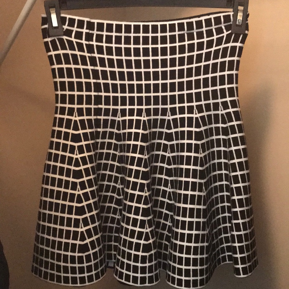 Skirt has been worn once & in Excellent condition.